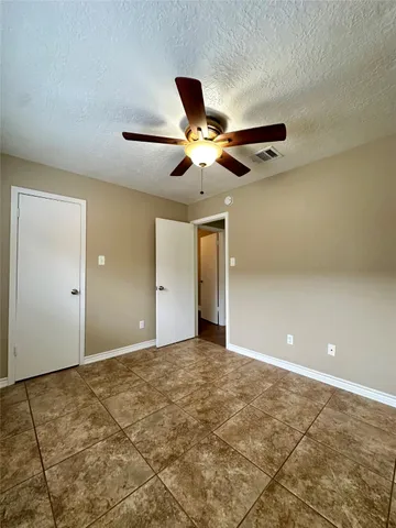 a kitchen with a stove a sink and a refrigerator