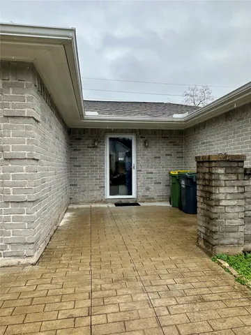 a kitchen with a stove a refrigerator and a microwave