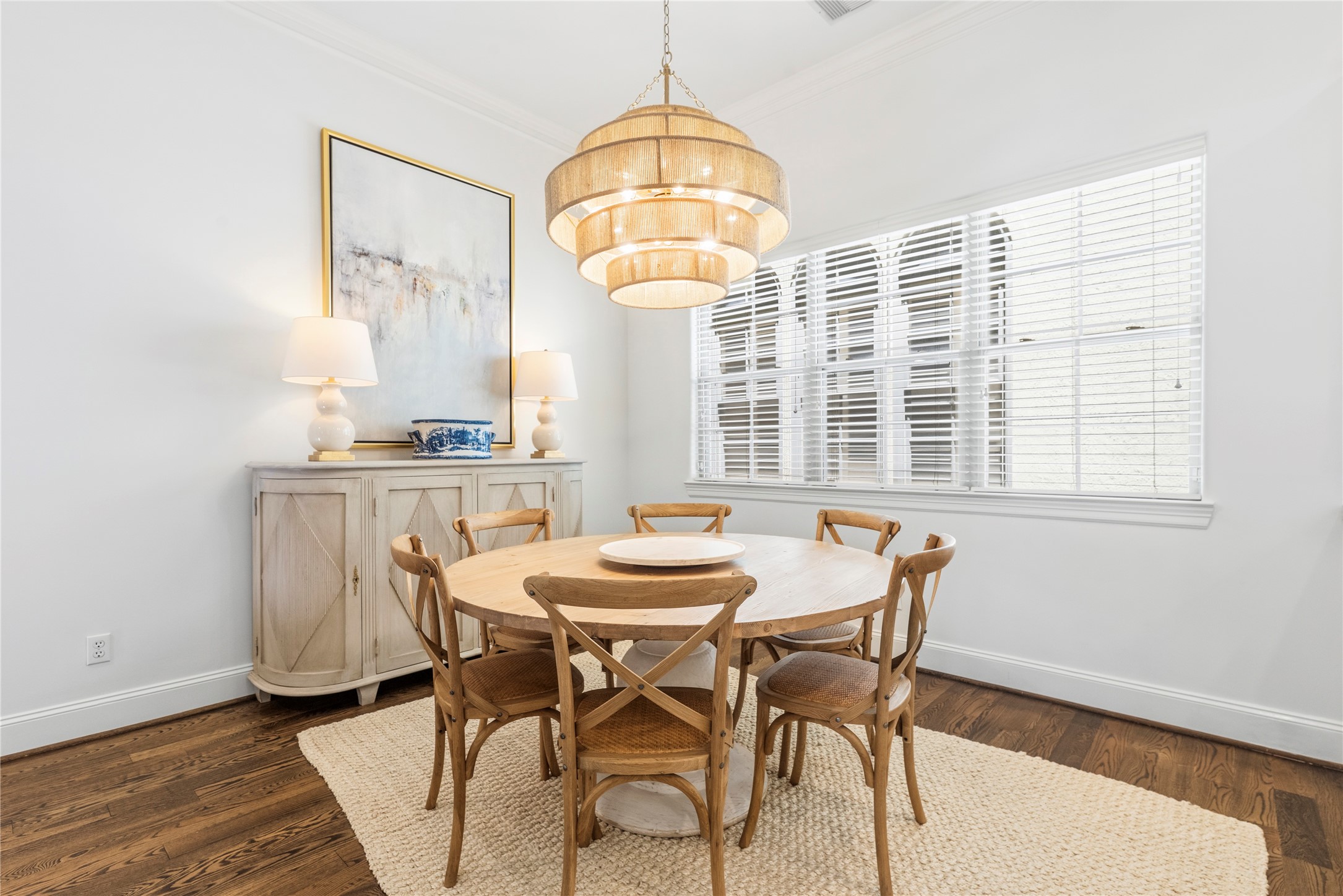 1537 Haddon Street Houston, TX 77006 - Photo 14 of 48 This dining area features large windows with blinds allows natural light.