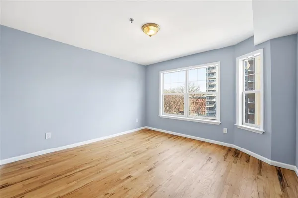 an empty room with windows