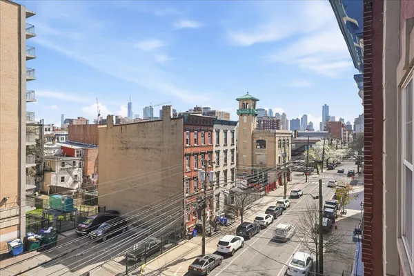 a view of a city with tall buildings