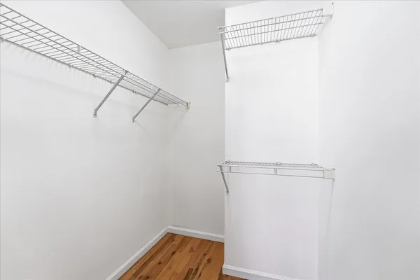 a view of small space with racks on the wall