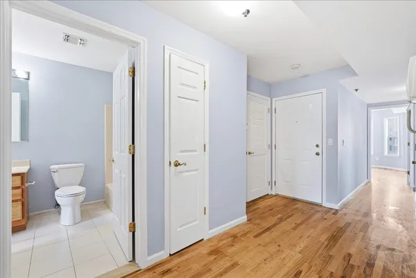 a bathroom view with a sink toilet and shower