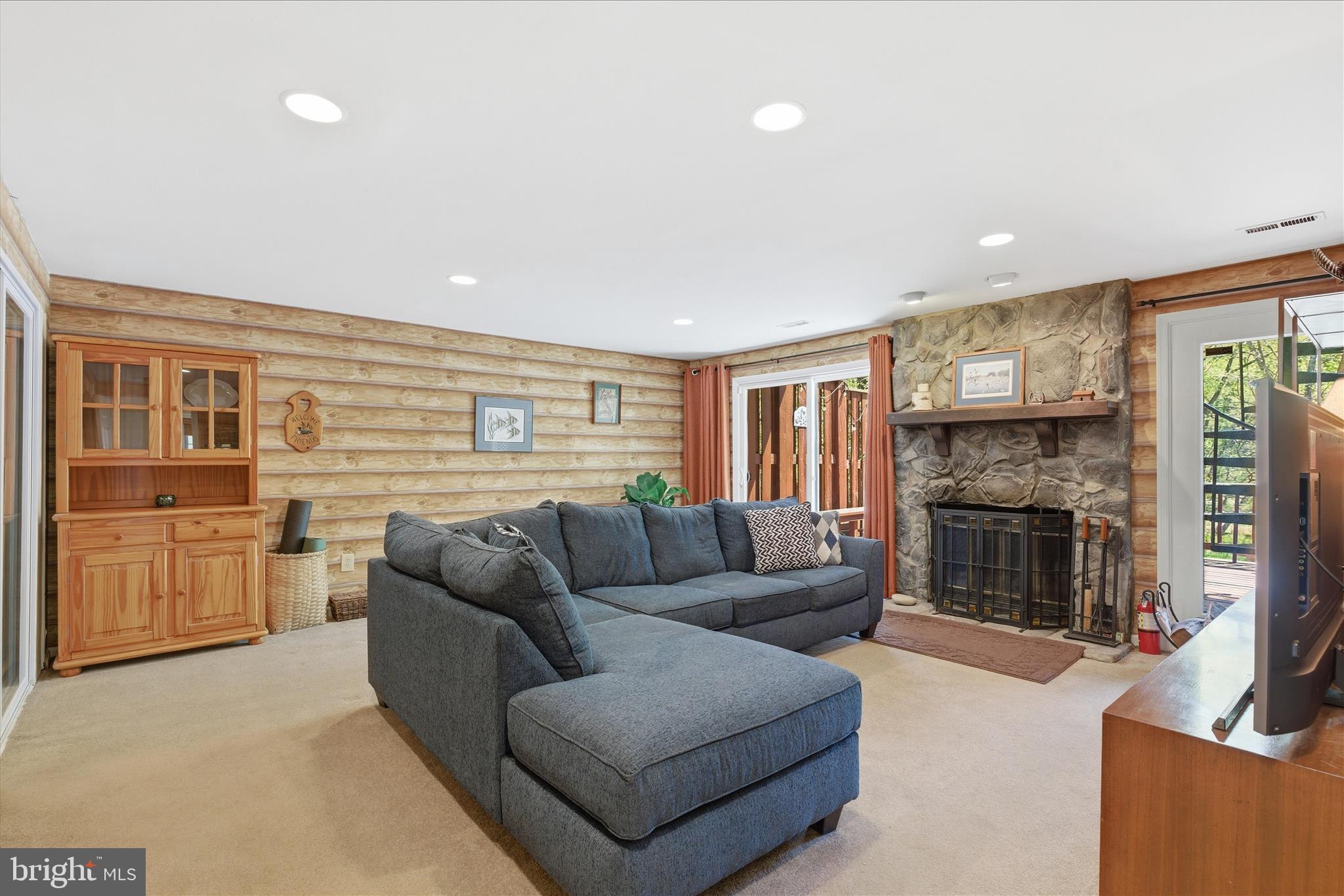 1943 Hickory Hill Lane Silver Spring, MD 20906 - Photo 21 of 54 a living room with furniture and a fireplace
