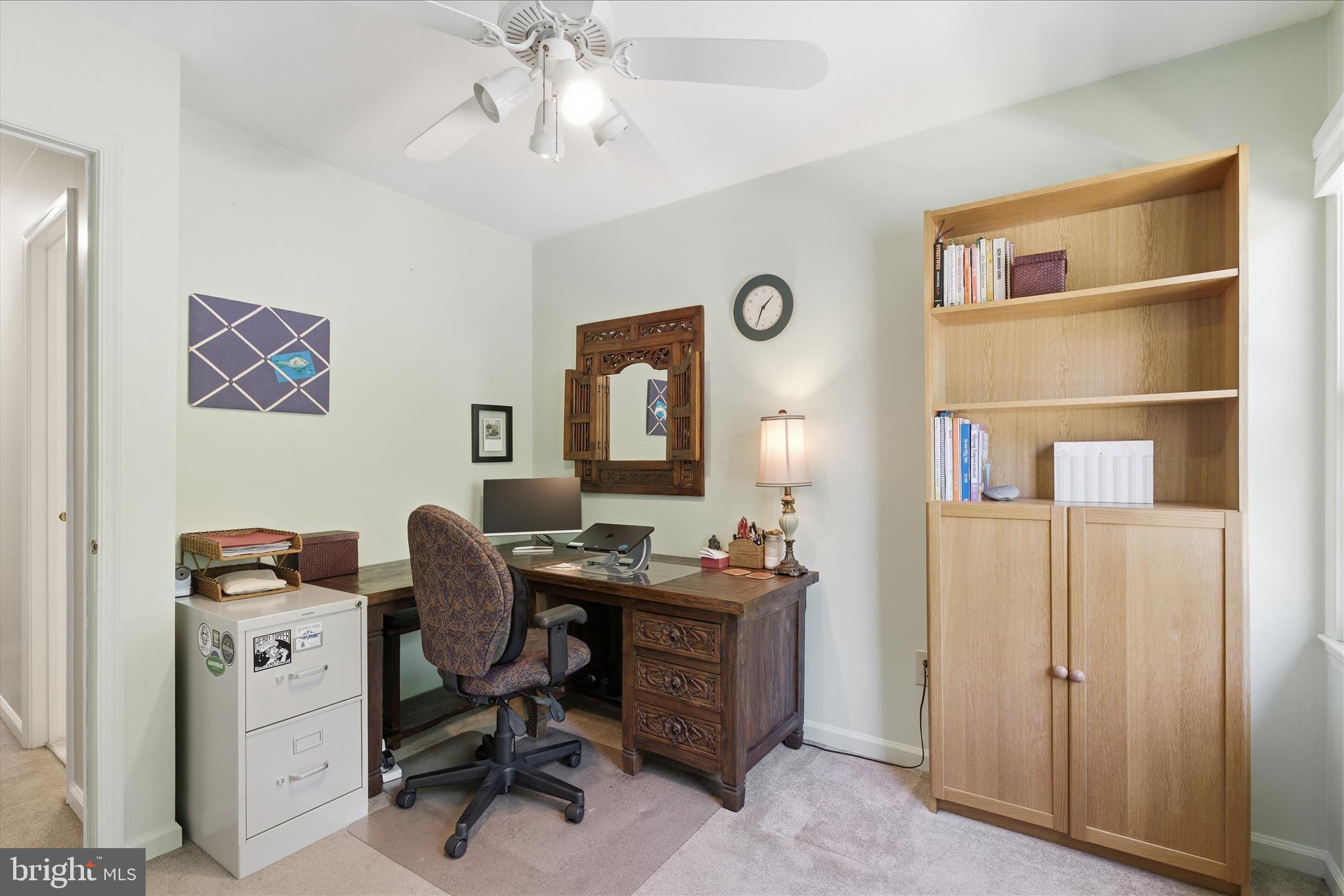 1943 Hickory Hill Lane Silver Spring, MD 20906 - Photo 25 of 54 a view of a workspace with furniture and a window