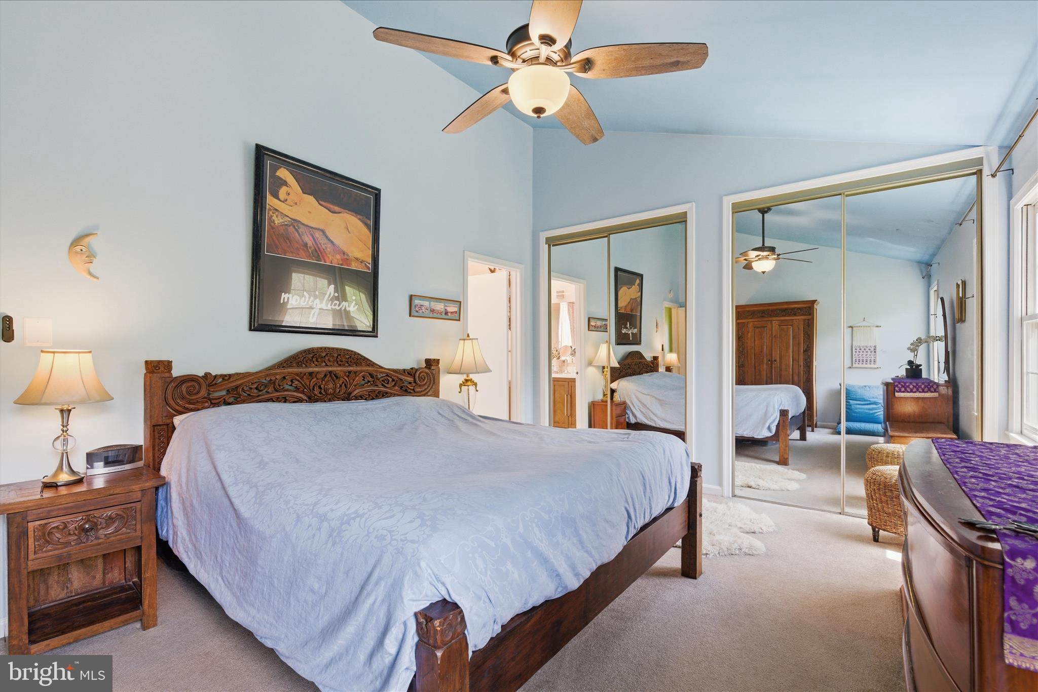 1943 Hickory Hill Lane Silver Spring, MD 20906 - Photo 30 of 54 a bedroom with bed and a chandelier