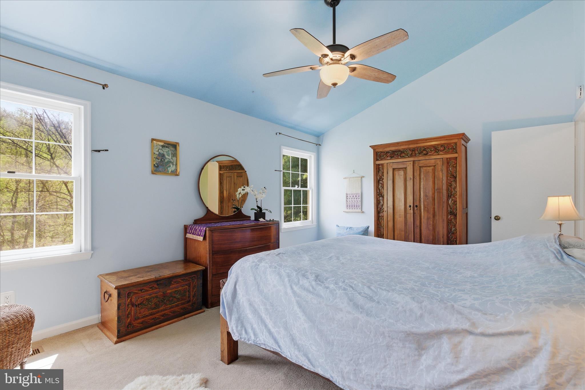 1943 Hickory Hill Lane Silver Spring, MD 20906 - Photo 31 of 54 a bedroom with a bed and a dresser