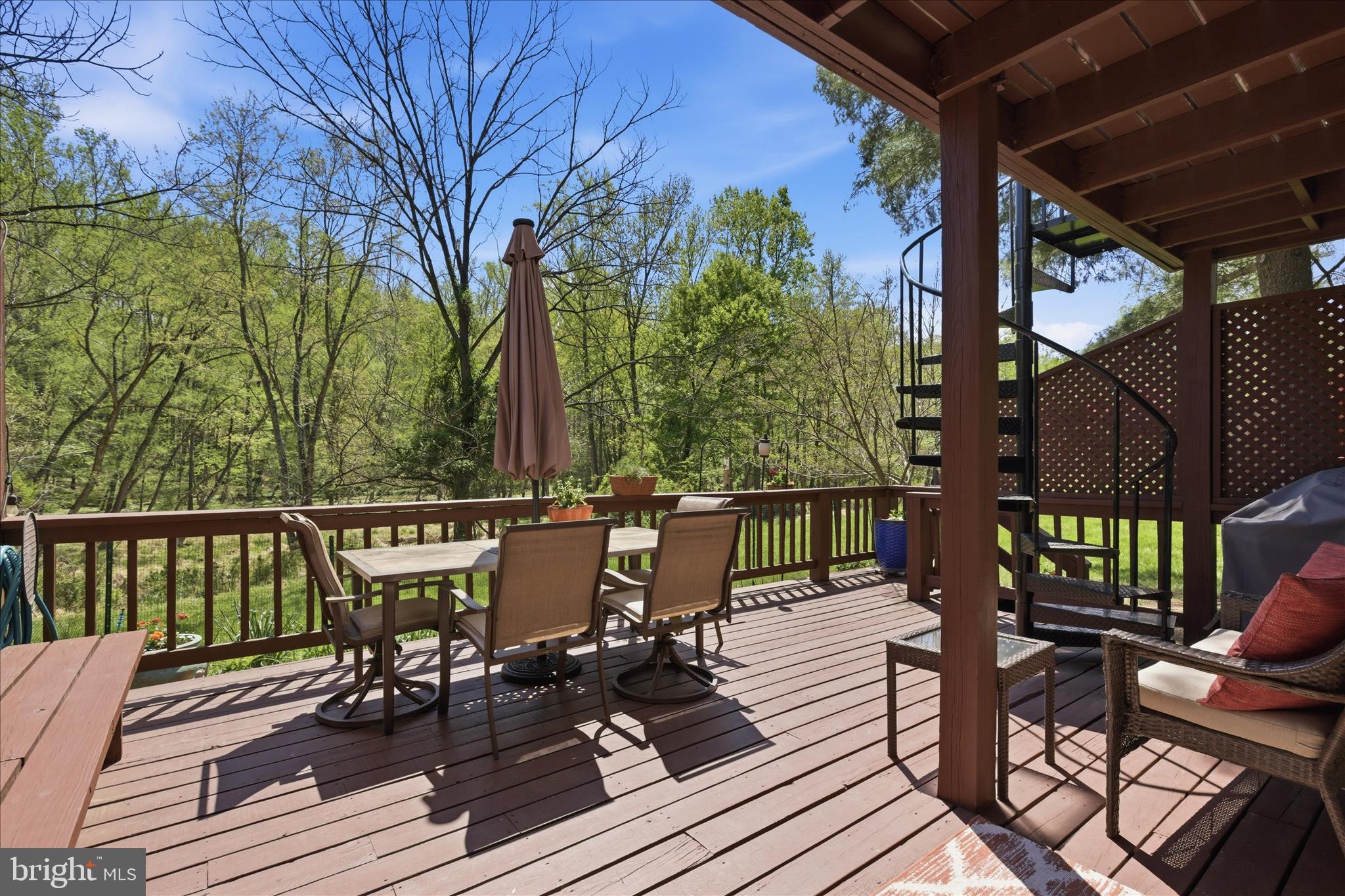 1943 Hickory Hill Lane Silver Spring, MD 20906 - Photo 39 of 54 a view of a chairs and table on the deck