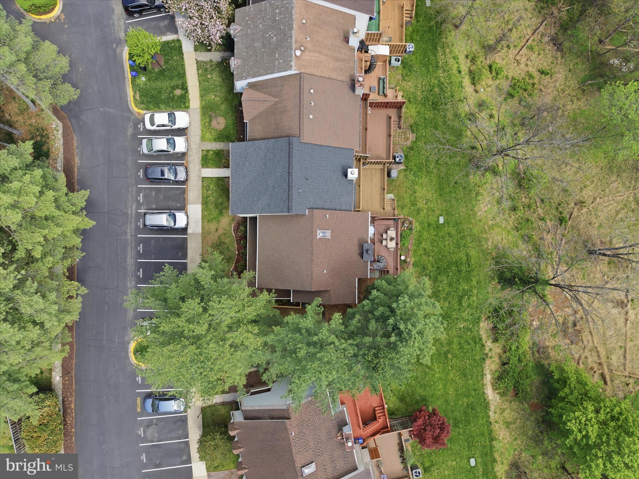 1943 Hickory Hill Lane Silver Spring, MD 20906 - Photo 49 of 54 an aerial view of a house with a yard and trees