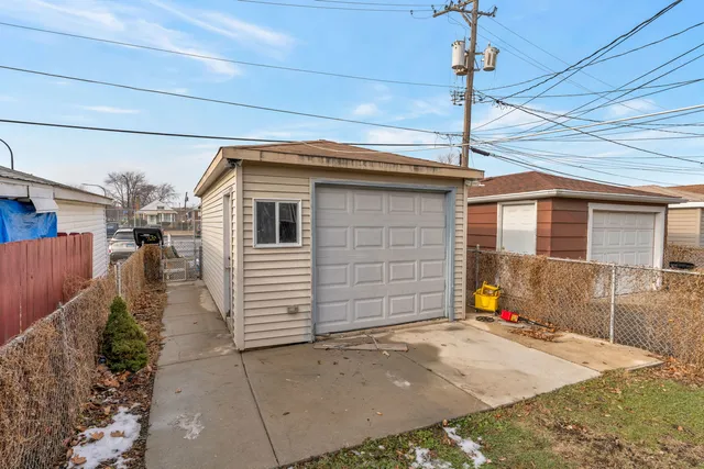 a front view of a house with a garage