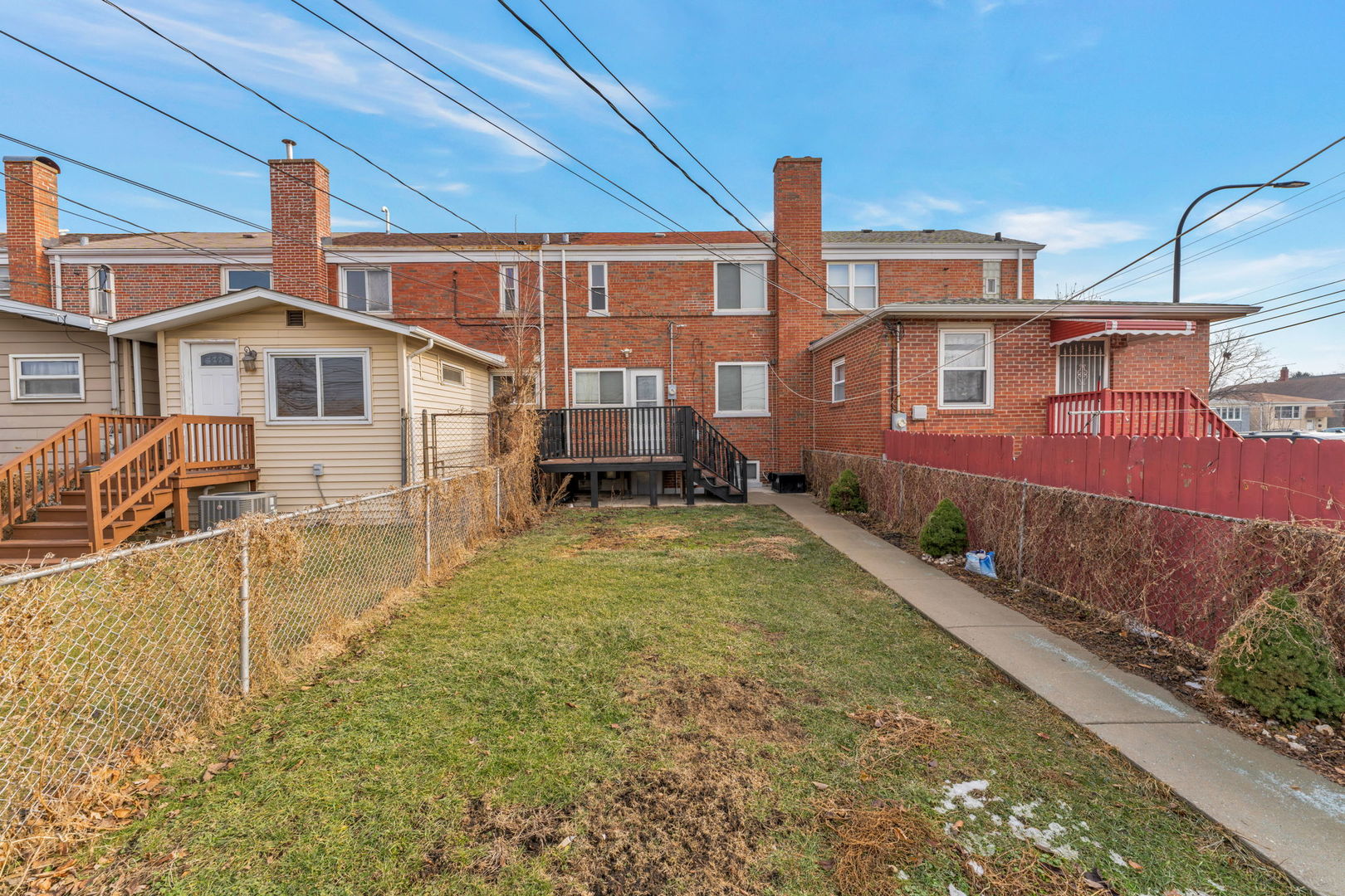 3142 54th Court Cicero, IL 60804 - Photo 2 of 15 a front view of a house with a yard