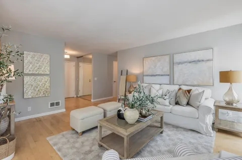 a living room with furniture and a couch