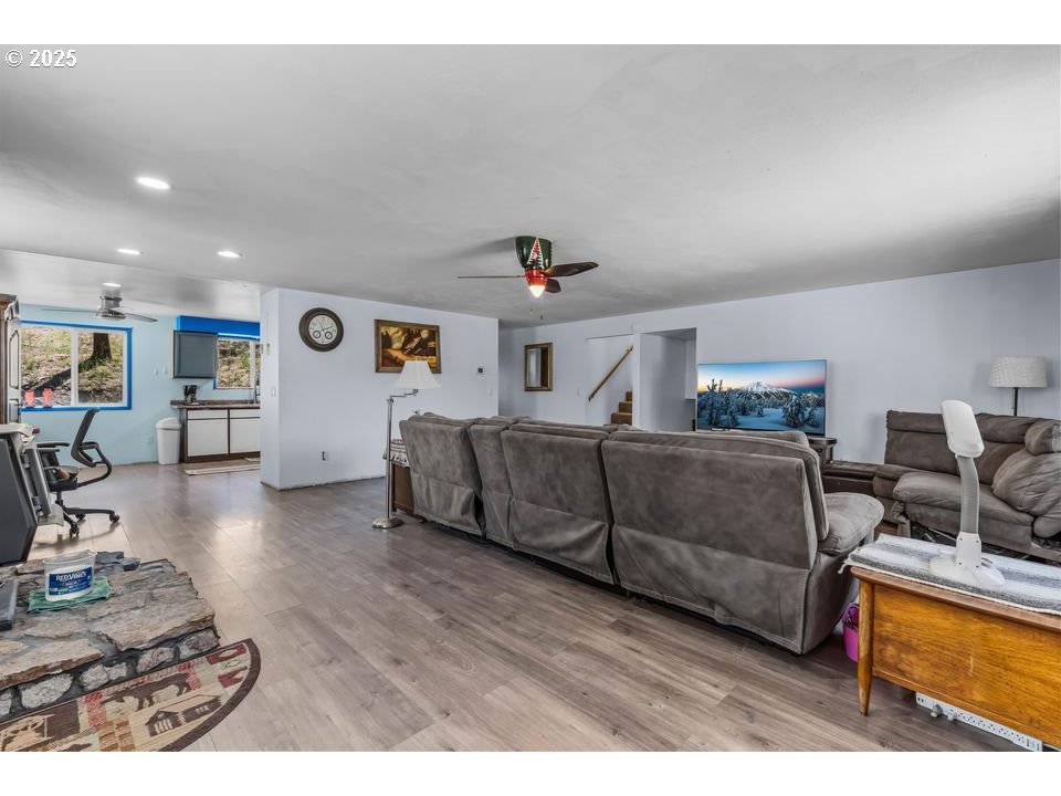 4800 Mill Creek Road Prineville, OR 97754 - Photo 14 of 40 a living room with furniture and a flat screen tv