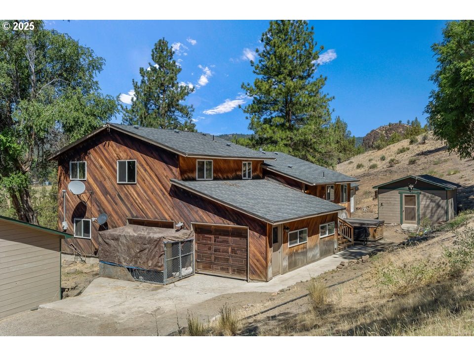 4800 Mill Creek Road Prineville, OR 97754 - Photo 24 of 40 a aerial view of a house with a porch