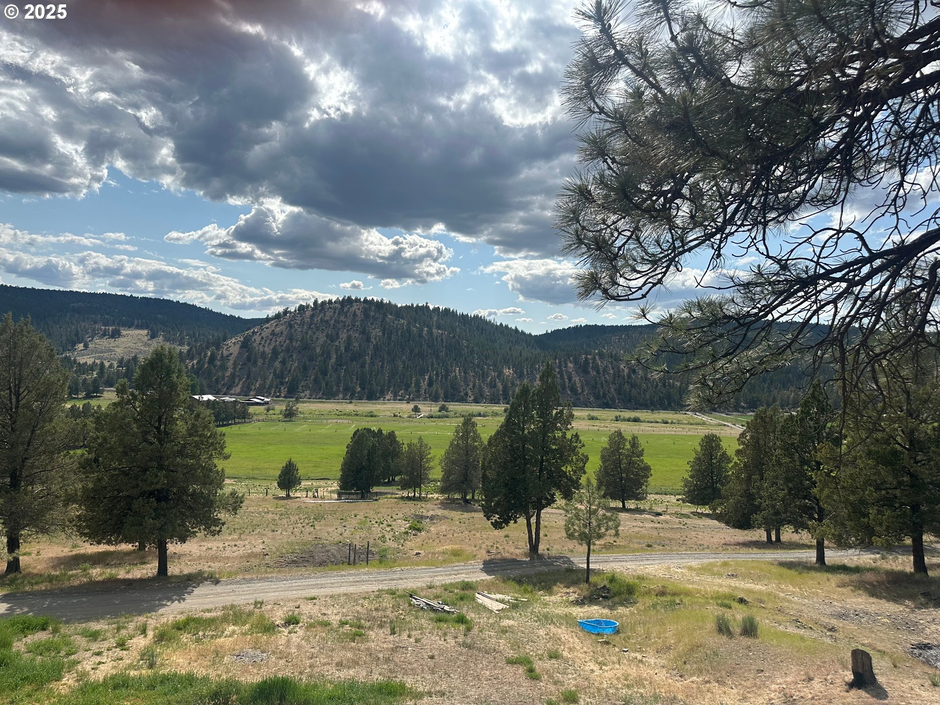 4800 Mill Creek Road Prineville, OR 97754 - Photo 3 of 40 a view of a swimming pool with a patio