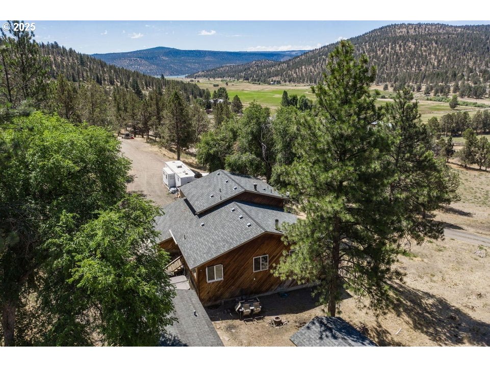 4800 Mill Creek Road Prineville, OR 97754 - Photo 36 of 40 a view of a house with a yard