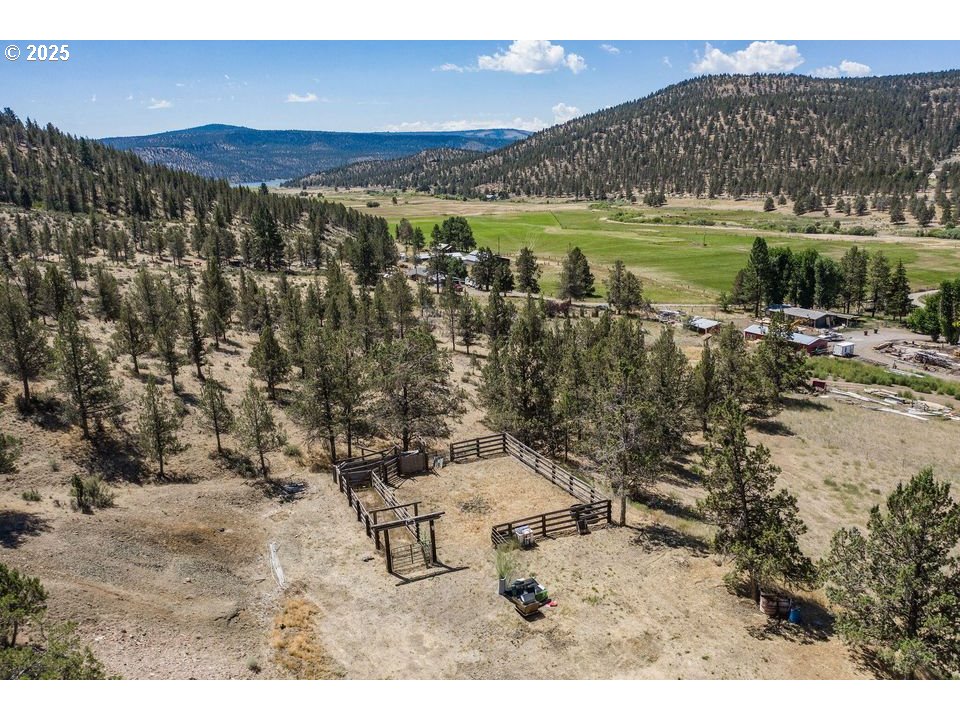 4800 Mill Creek Road Prineville, OR 97754 - Photo 5 of 40 a view of a lake with a yard