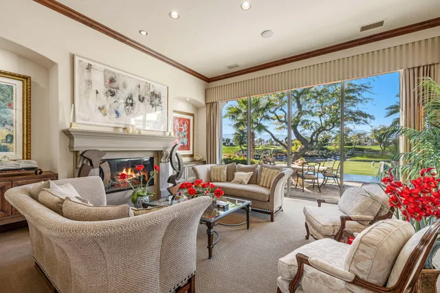 a kitchen with kitchen island granite countertop a sink and a stove