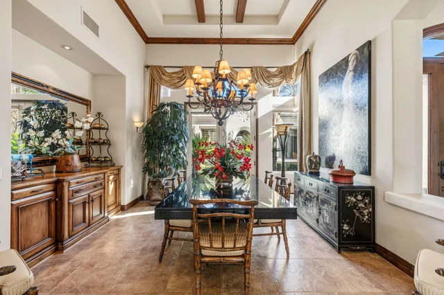 a spacious bathroom with a granite countertop sink a mirror and a shower