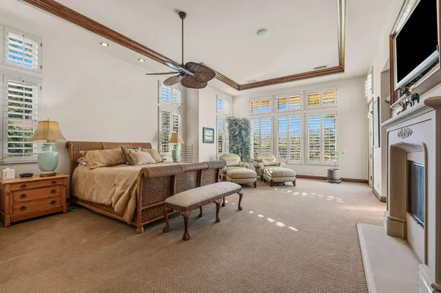 a view of a swimming pool with an outdoor space and seating area