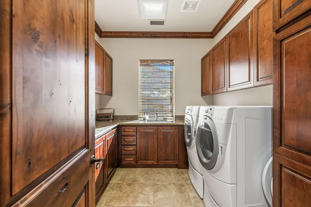 a dining room with furniture and a garden view