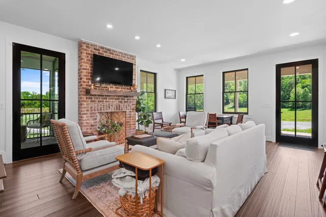 a view of a dining room with furniture and window