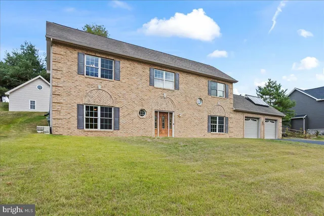 a house view with a garden space