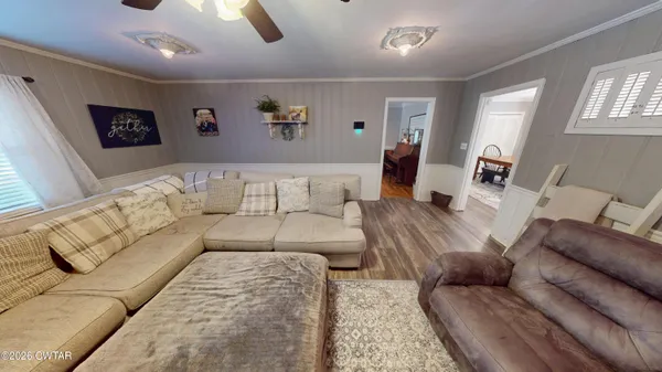 a living room with furniture and a couch