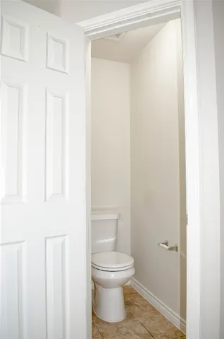 a bathroom with a toilet