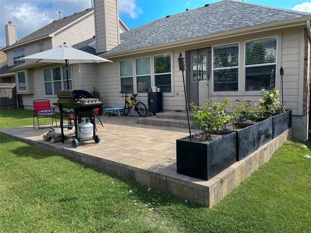 a front view of a house with patio
