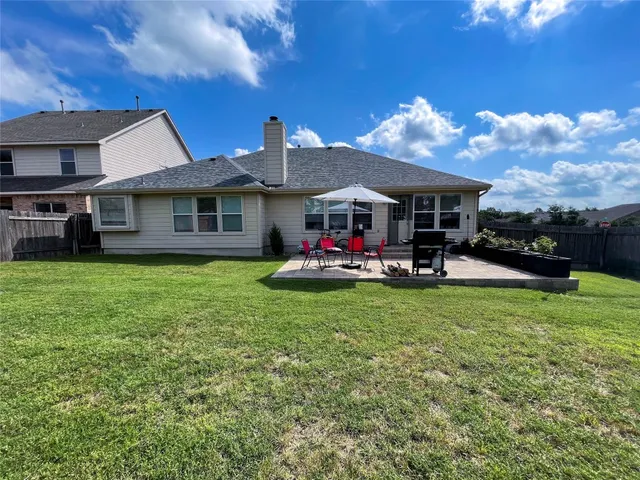 a childrens park with lots of swings and slides