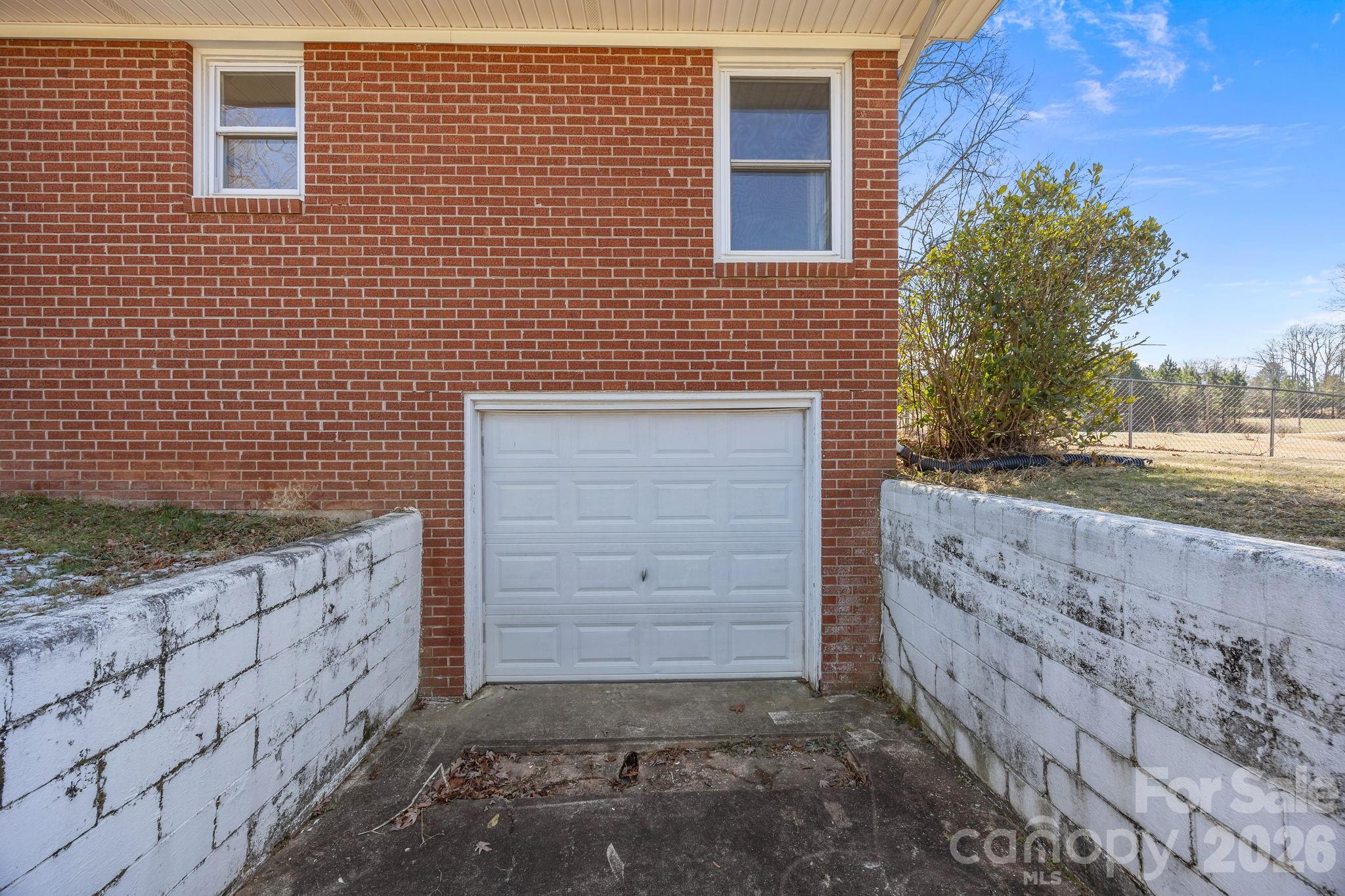 33633 Mann Road Albemarle, NC 28001 - Photo 11 of 39 a view of outdoor space and brick wall