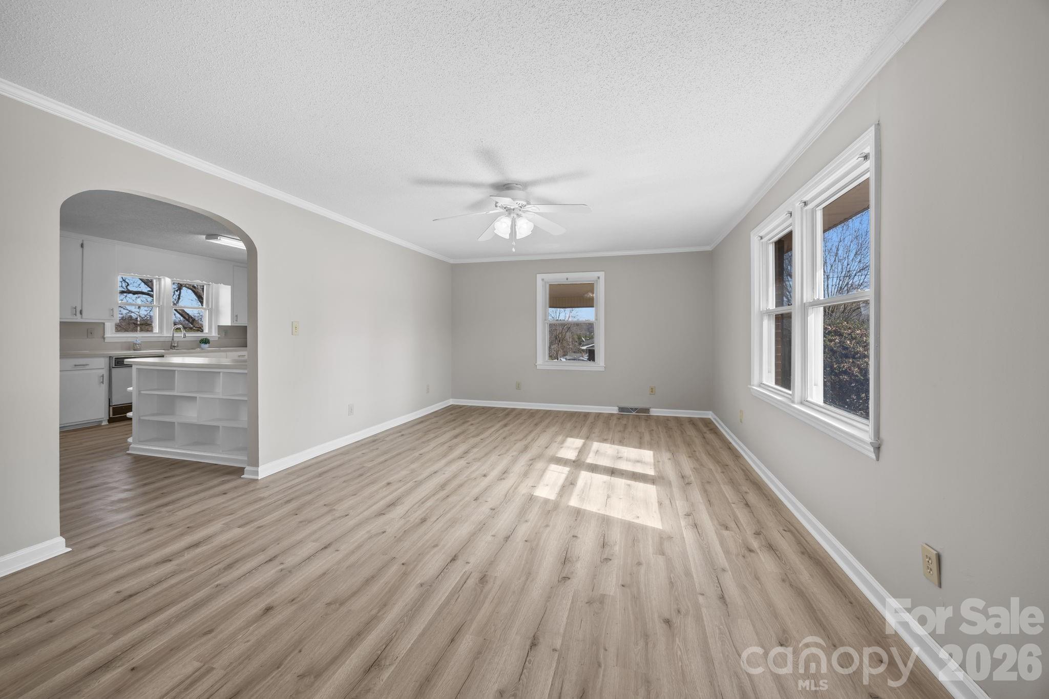 33633 Mann Road Albemarle, NC 28001 - Photo 15 of 39 wooden floor in an empty room with a window
