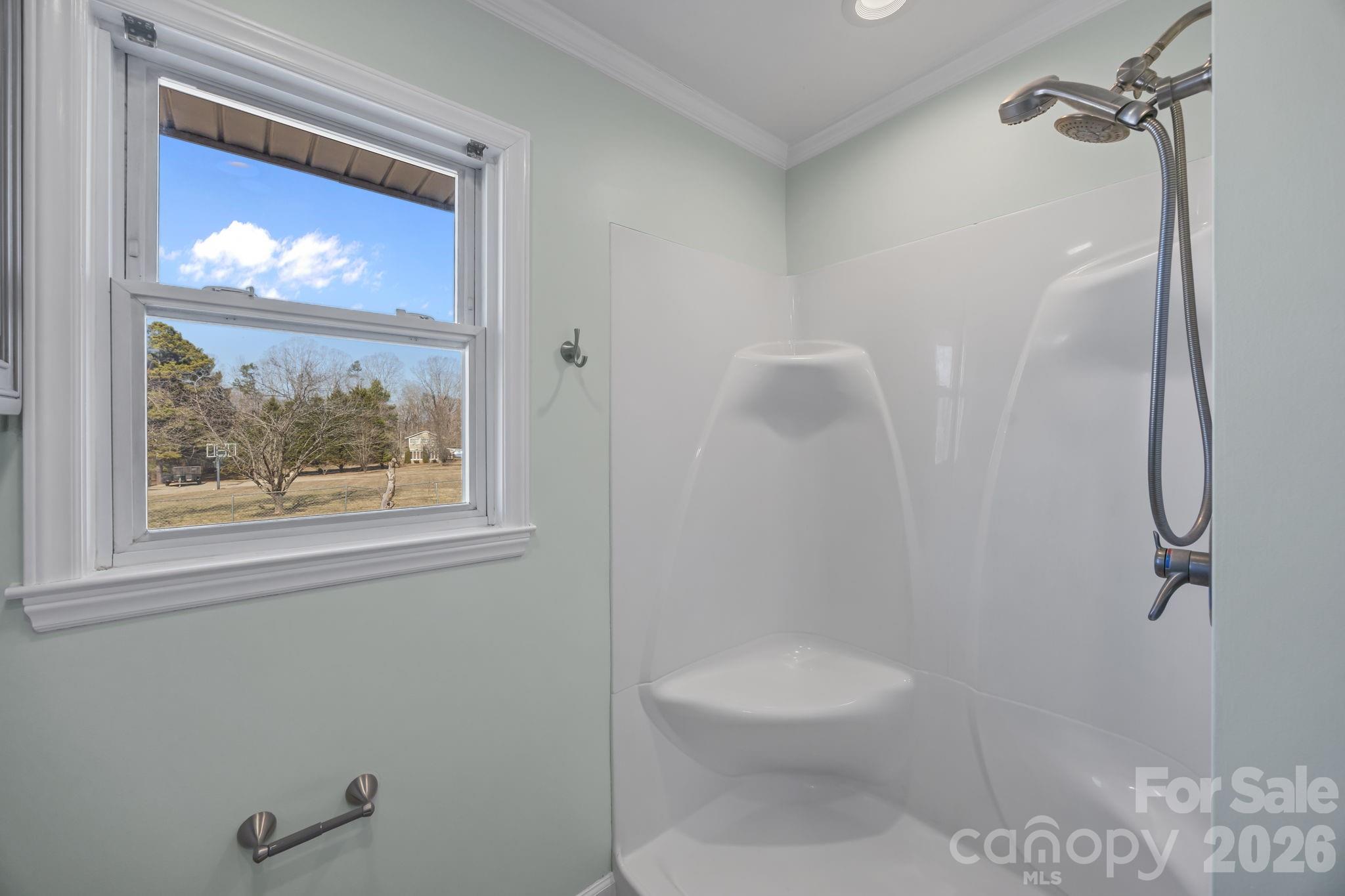 33633 Mann Road Albemarle, NC 28001 - Photo 33 of 39 a bathroom with a toilet and a shower