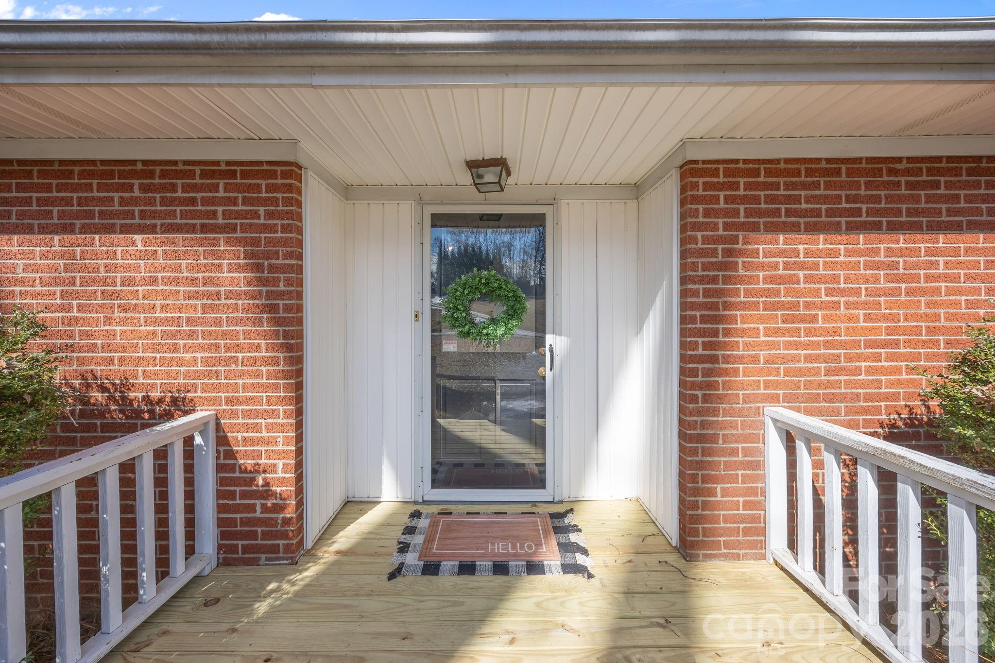 33633 Mann Road Albemarle, NC 28001 - Photo 4 of 39 a view of a door and chair