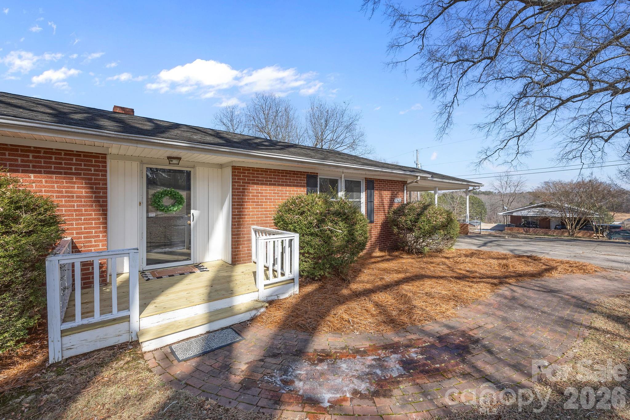 33633 Mann Road Albemarle, NC 28001 - Photo 5 of 39 a view of a house with backyard and sitting area