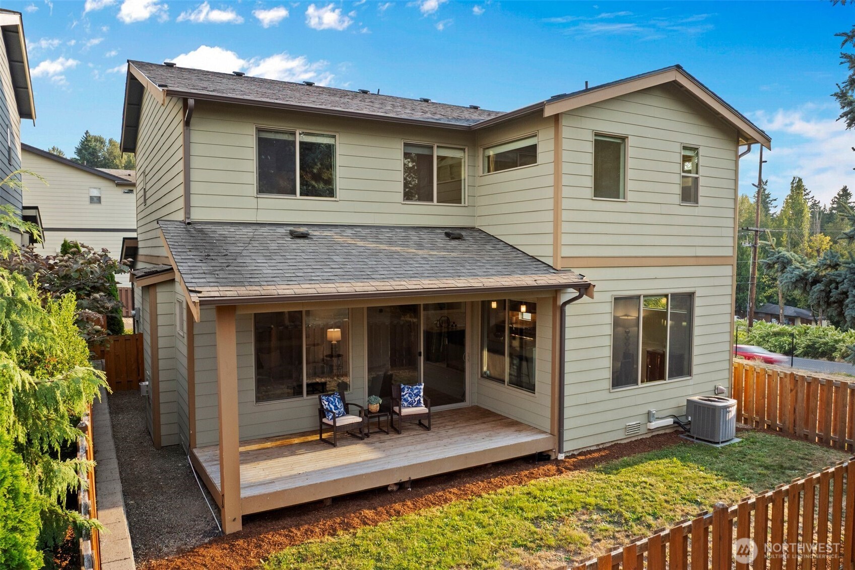 19225 97th Avenue South Renton, WA 98055 - Photo 35 of 39 a view of a house with a yard and furniture