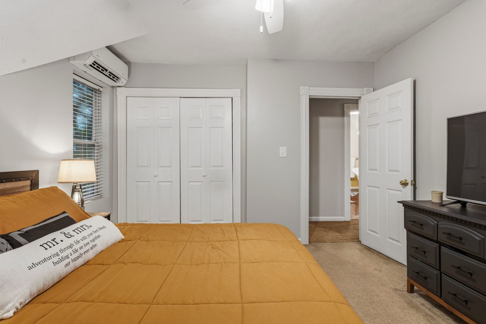 419 South Hamilton Street McLean, IL 61754 - Photo 17 of 41 a bedroom with a bed and flat screen tv