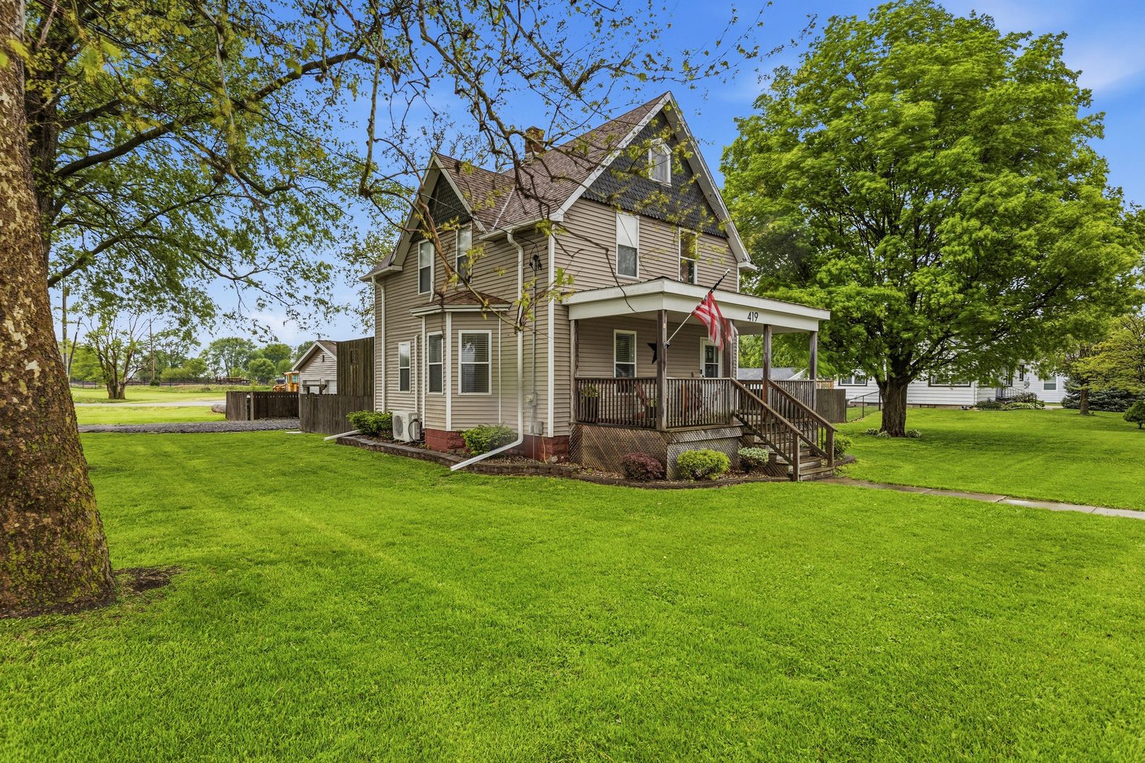 419 South Hamilton Street McLean, IL 61754 - Photo 2 of 41 a view of a house with a yard