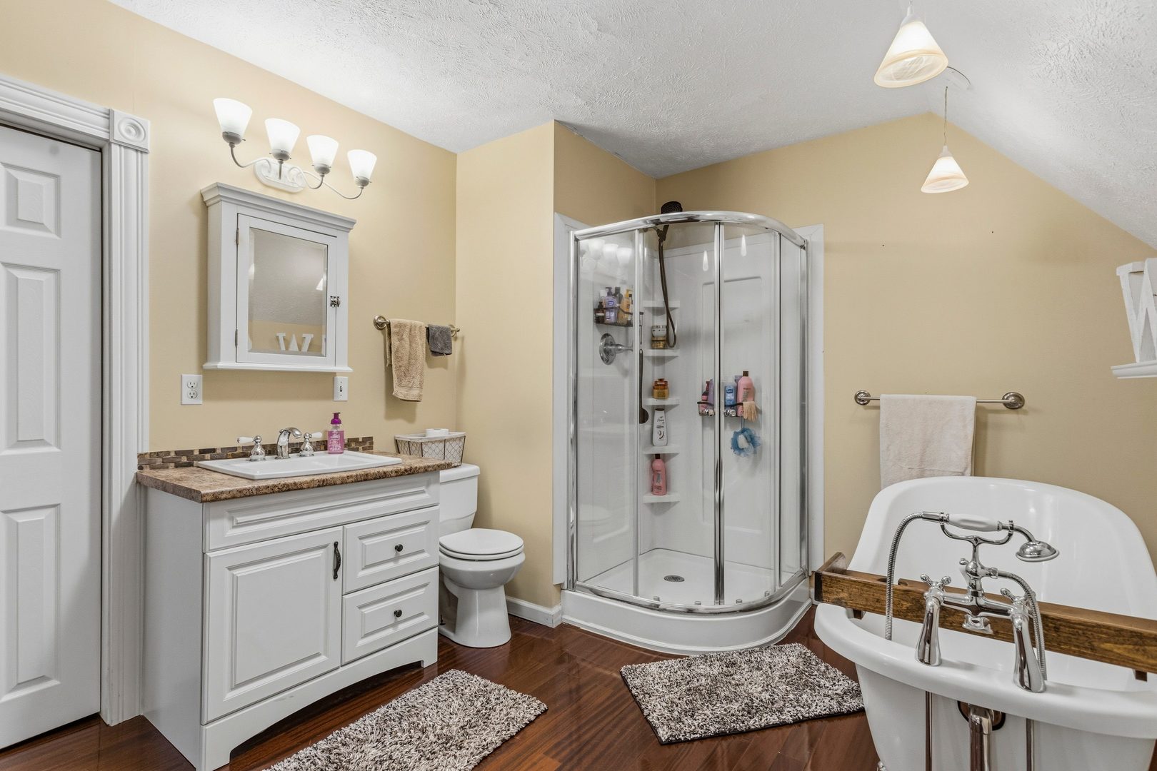 419 South Hamilton Street McLean, IL 61754 - Photo 23 of 41 a bathroom with a granite countertop sink a toilet and shower