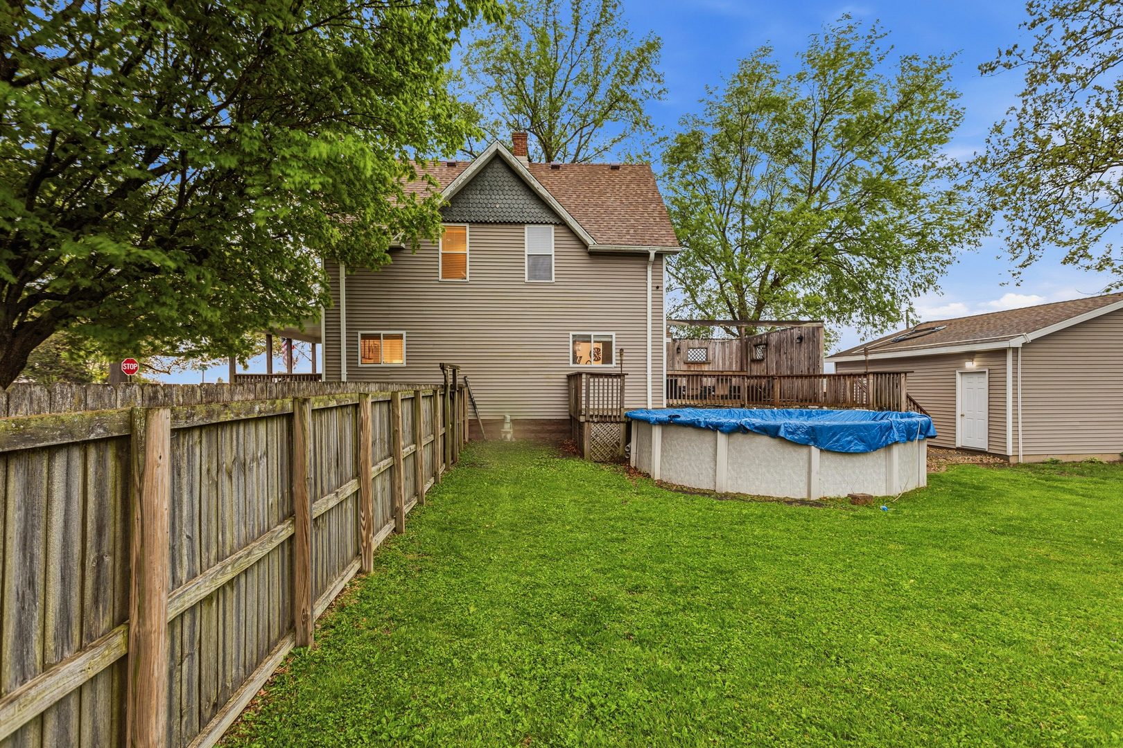 419 South Hamilton Street McLean, IL 61754 - Photo 34 of 41 a view of a house with backyard and a tree