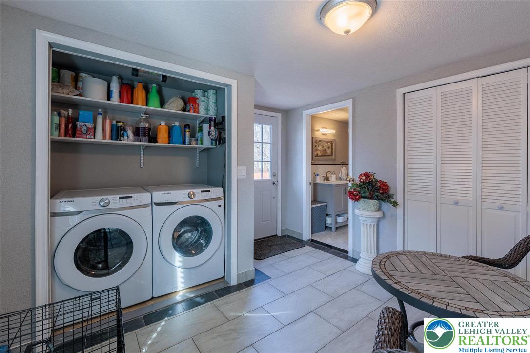 38 Water Street Wind Gap, PA 18091 - Photo 13 of 37 a living room with furniture and a book shelf