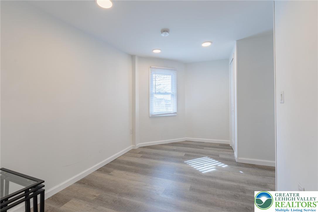 38 Water Street Wind Gap, PA 18091 - Photo 18 of 37 a view of empty room with wooden floor and fan