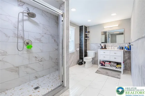 a view of a bathroom with a shower