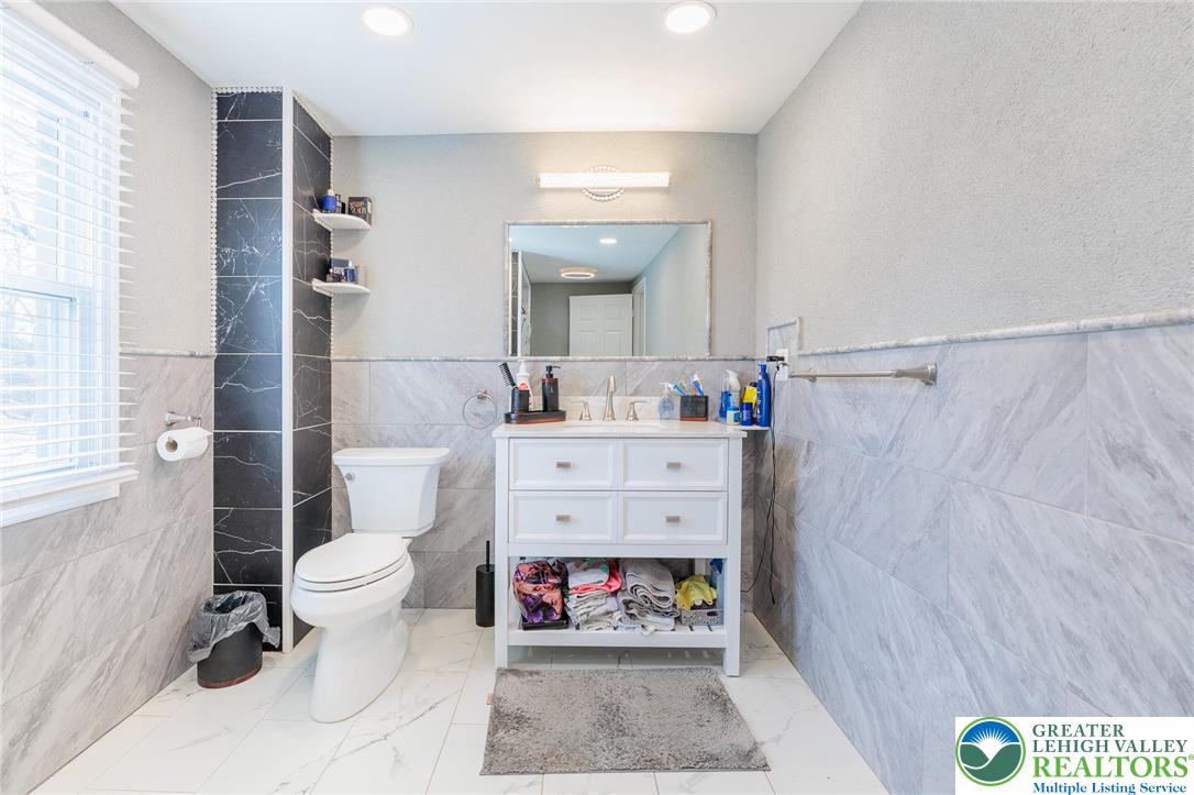 38 Water Street Wind Gap, PA 18091 - Photo 21 of 37 a bathroom with a sink toilet and shower