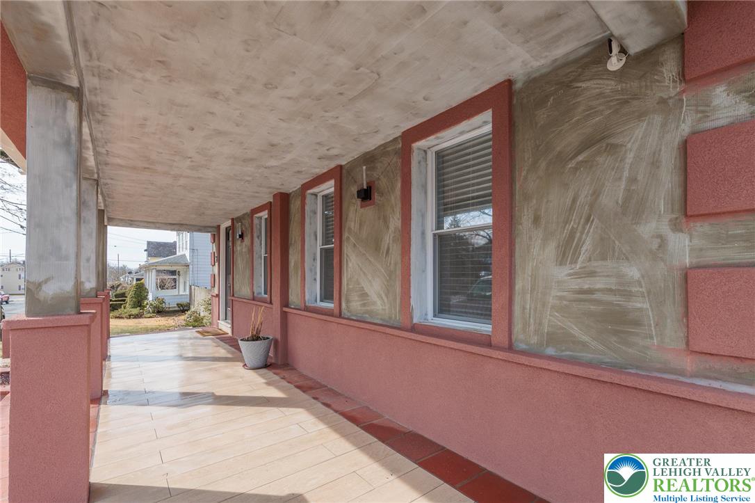 38 Water Street Wind Gap, PA 18091 - Photo 5 of 37 a living room with furniture and a large window