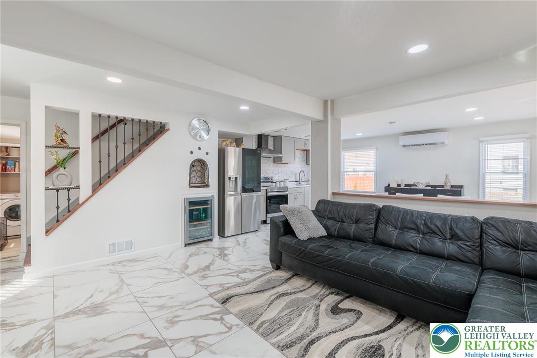 38 Water Street Wind Gap, PA 18091 - Photo 7 of 37 a living room with furniture and kitchen view