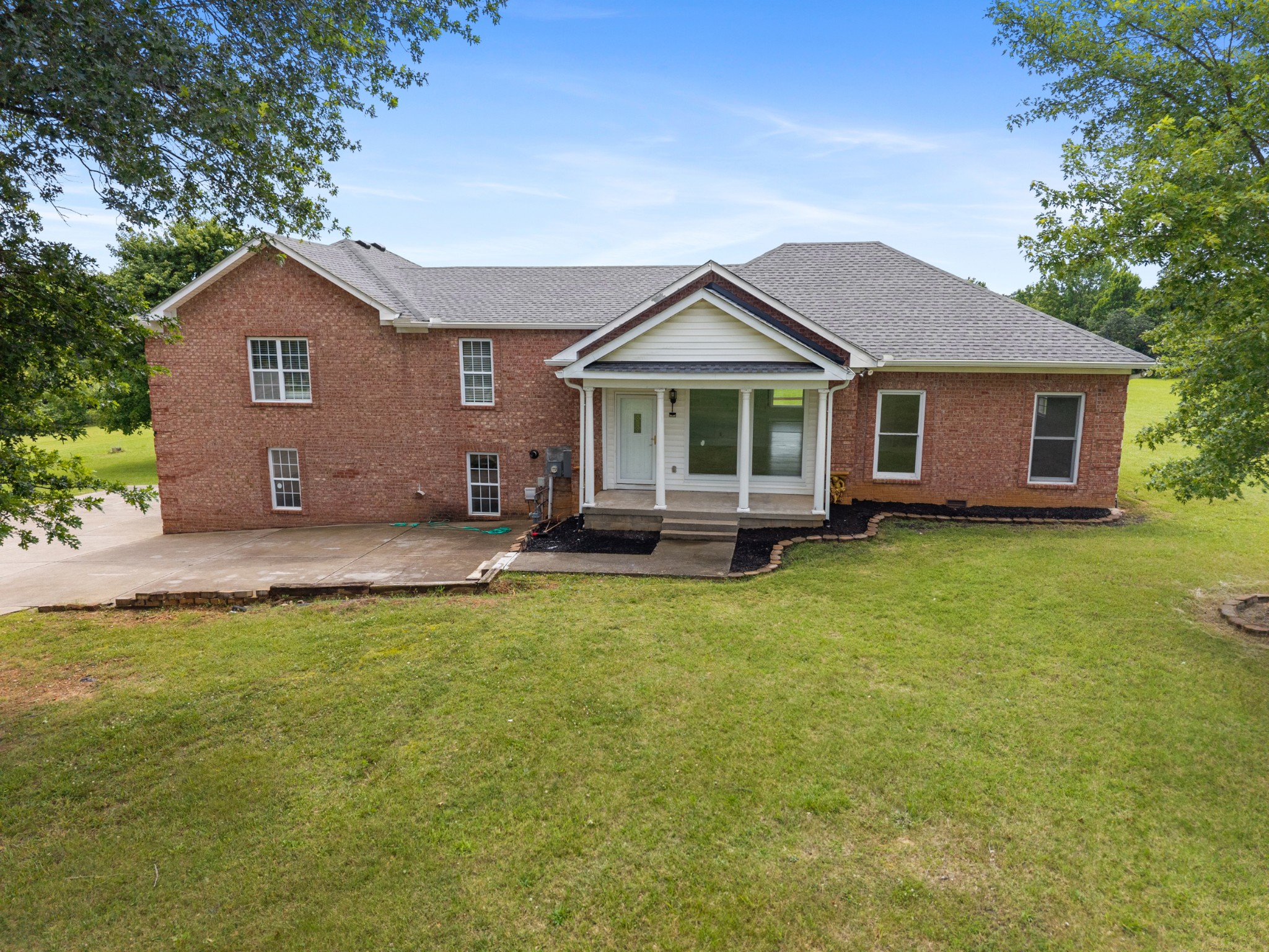 4602 Washington Road Springfield, TN 37172 - Photo 49 of 63 a front view of a house with a garden and yard