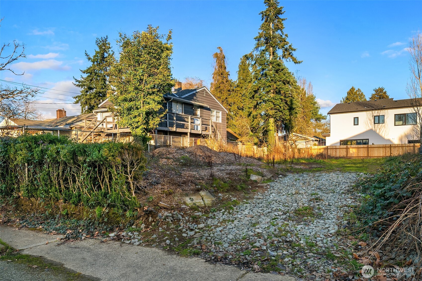 8444 46th Avenue South Seattle, WA 98118 - Photo 4 of 14 a view of a house with a yard