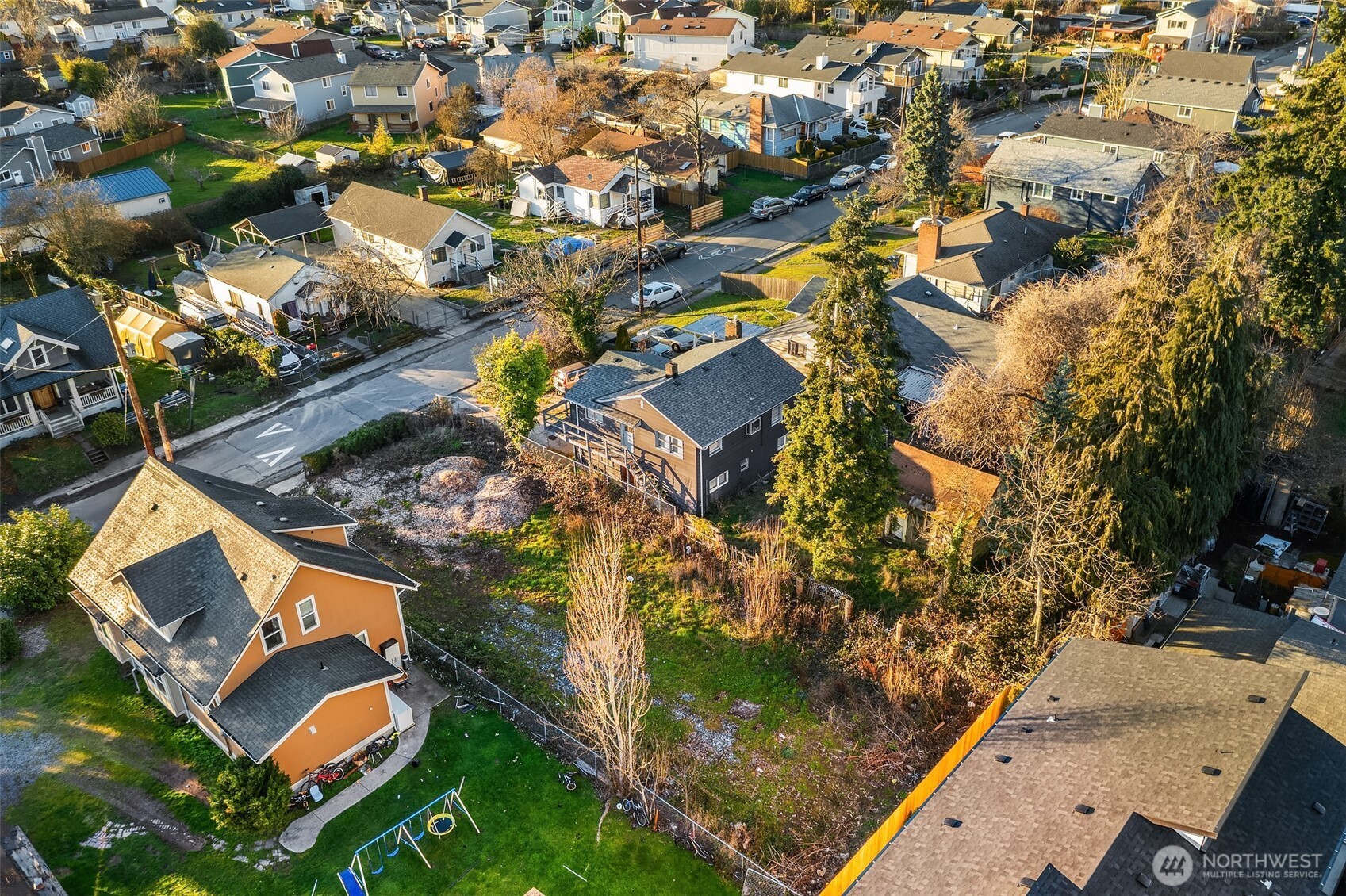 8444 46th Avenue South Seattle, WA 98118 - Photo 7 of 14 an aerial view of residential house with outdoor space and swimming pool